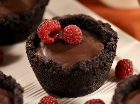 chocolate filled cupcake with raspberries