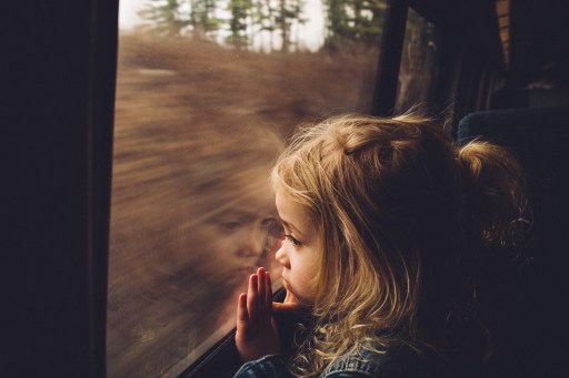 train-window-little-girl